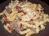 Rotini with Sausage, Artichokes, and Sun-Dried Tomatoes