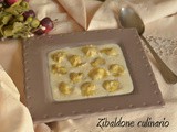 Anolini piacentini conditi con la crema al parmigiano di Bottura