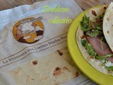 Piada allo squaquerone, rucola e lombetto affumicato